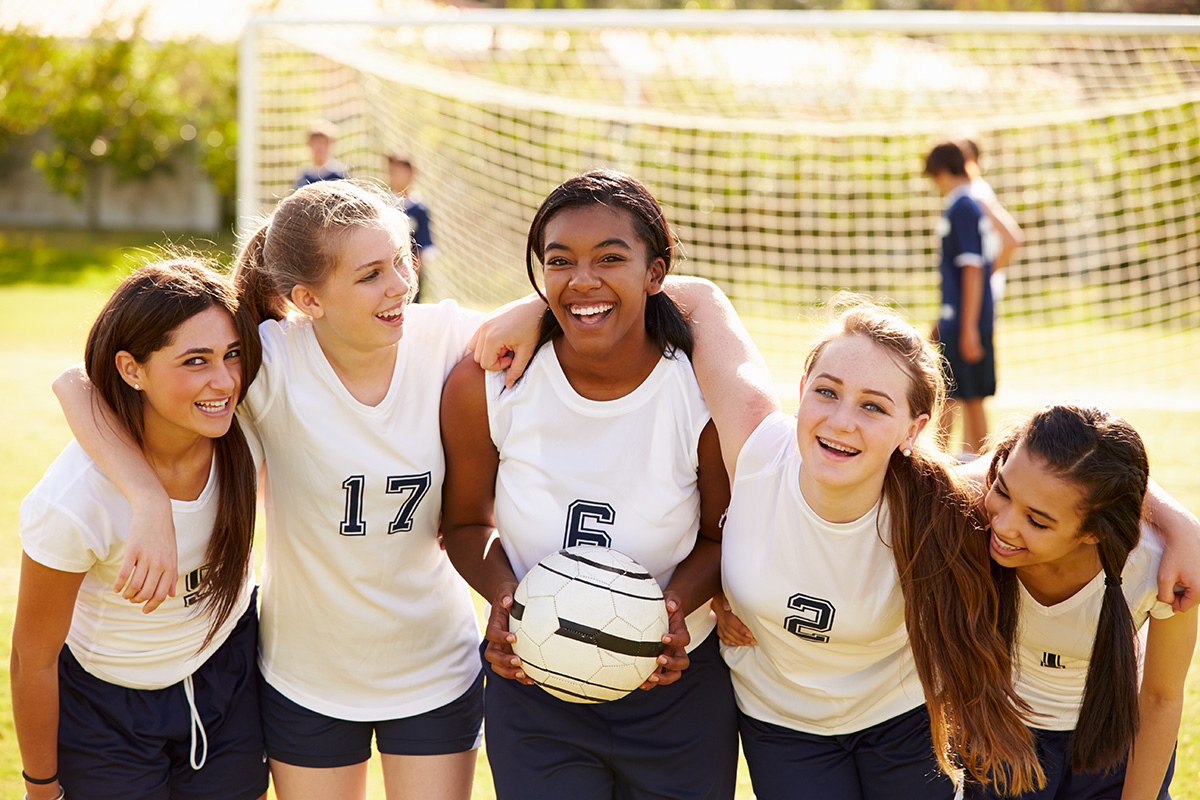 Members Of Female High School Soccer Team Athletes
