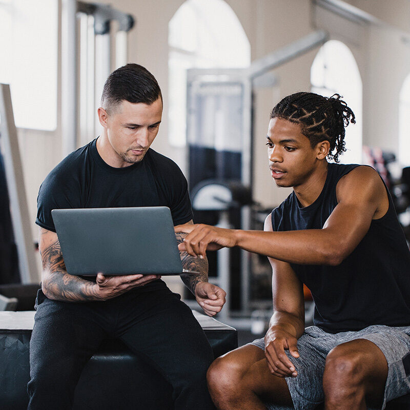 Personal Trainer Consulting with a Athletes about Mental Health